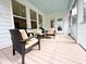 Relaxing screened porch with comfortable seating and a serene outdoor view at 530 Amalie Farms Dr, Charleston, SC 29492