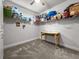 Walk-in closet featuring shelving, carpet and a window at 530 Amalie Farms Dr, Charleston, SC 29492