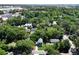 Aerial view of a charming home nestled among lush greenery in a serene neighborhood at 5806 Beverly Dr, Hanahan, SC 29410