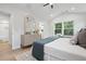 Bright bedroom boasts vaulted ceilings, a decorative mirror over the dresser, and natural light at 5806 Beverly Dr, Hanahan, SC 29410