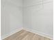 A walk-in closet with installed shelving, a clean design, and ample storage at 5806 Beverly Dr, Hanahan, SC 29410