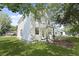 Charming two-story house has a large front yard, front porch, and a lovely, shaded yard at 5806 Beverly Dr, Hanahan, SC 29410