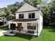 Gorgeous two-story home with a covered front porch and a meticulously maintained yard at 5806 Beverly Dr, Hanahan, SC 29410