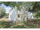 Charming two-story house has a large front yard, front porch, and a lovely, shaded yard at 5806 Beverly Dr, Hanahan, SC 29410