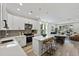 Open-concept kitchen with island seating that flows seamlessly into the living area at 5806 Beverly Dr, Hanahan, SC 29410