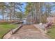 Beautiful backyard featuring a boat ramp leading to the river and an outdoor seating area at 634 Lakeside Dr, Moncks Corner, SC 29461