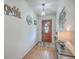 Bright entryway with wood floors, decorative lighting, and a stained glass front door at 634 Lakeside Dr, Moncks Corner, SC 29461