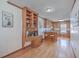 Bright kitchen with breakfast bar, custom cabinetry, and wood floors at 634 Lakeside Dr, Moncks Corner, SC 29461