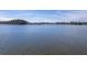 Beautiful, clear lake view showcasing the serene waters and the opposite shoreline with tree line at 634 Lakeside Dr, Moncks Corner, SC 29461