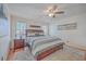 Bright main bedroom with a king bed, fluffy rug, and coordinating bedside tables at 634 Lakeside Dr, Moncks Corner, SC 29461