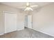 Bedroom with neutral walls, carpet, closet, and a ceiling fan at 8153 Governors Walk, North Charleston, SC 29418