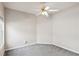 Bedroom with neutral walls, carpet, ceiling fan, and a bright window at 8153 Governors Walk, North Charleston, SC 29418