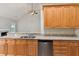 Bright kitchen featuring granite counters, stainless steel appliances and wood cabinets at 8153 Governors Walk, North Charleston, SC 29418