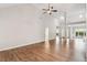 Bright, open-concept living room featuring wood floors and lots of natural light at 8153 Governors Walk, North Charleston, SC 29418
