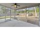 Spacious screened porch offering a view of the backyard playground at 8153 Governors Walk, North Charleston, SC 29418