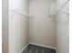 A walk-in closet features wire shelving for storage and gray carpeting at 8153 Governors Walk, North Charleston, SC 29418