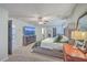 Primary bedroom with a ceiling fan, dresser, TV and dark doors that provide contrast at 100 Hunters Wood Dr, Summerville, SC 29485
