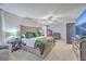 Primary bedroom showcasing carpet flooring, natural light, upholstered bed and ceiling fan at 100 Hunters Wood Dr, Summerville, SC 29485