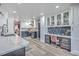 Bright kitchen with marble countertops, stainless steel appliances, and a built-in desk area at 100 Hunters Wood Dr, Summerville, SC 29485