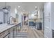 Spacious kitchen with granite countertops, stainless steel appliances, and wood floors at 100 Hunters Wood Dr, Summerville, SC 29485