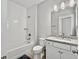 Bright bathroom featuring white subway tile in shower/tub and granite countertop on vanity at 1020 Lyle Way, Mount Pleasant, SC 29466