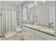Bathroom featuring granite countertops, double sinks, tub and shower with a curtain at 1020 Lyle Way, Mount Pleasant, SC 29466