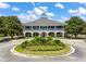 Clubhouse with a manicured flower garden in the circle drive at 1020 Lyle Way, Mount Pleasant, SC 29466