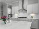 Well-appointed kitchen with white cabinets, a spacious island, and modern fixtures at 1020 Lyle Way, Mount Pleasant, SC 29466