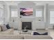 Inviting living room showcases a fireplace with built-in cabinets and a serene aesthetic at 1020 Lyle Way, Mount Pleasant, SC 29466