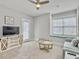 Comfortable living room with plenty of light, seating and TV console at 1020 Lyle Way, Mount Pleasant, SC 29466