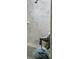 Bright shower features marble-look tile, seating and rainfall showerhead at 1020 Lyle Way, Mount Pleasant, SC 29466