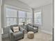 Cozy sitting room is furnished with comfortable seating and ample natural light at 1020 Lyle Way, Mount Pleasant, SC 29466