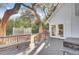 Back deck with a grill, overlooking the trees and lush backyard at 1048 Wharf Indigo Pl, Mount Pleasant, SC 29464