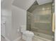 Bathroom featuring a glass shower and a white toilet at 1048 Wharf Indigo Pl, Mount Pleasant, SC 29464