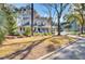 Charming home with a welcoming front porch and beautiful curb appeal at 1048 Wharf Indigo Pl, Mount Pleasant, SC 29464