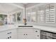 Bright kitchen features white countertops, stainless appliances, and black fixtures at 1048 Wharf Indigo Pl, Mount Pleasant, SC 29464