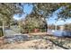 Scenic community pond with a metal bridge and lush surroundings at 1048 Wharf Indigo Pl, Mount Pleasant, SC 29464