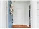 Charming entryway with a hardwood floor and a decorative cotton wreath at 107 Bogard St, Charleston, SC 29403