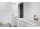 Modern bathroom with dual sinks, white quartz countertops, and gold fixtures at 1137 Moss Grove Dr Dr, Moncks Corner, SC 29461