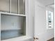 Bathroom view showcasing a thermostat window between the rooms at 1137 Moss Grove Dr Dr, Moncks Corner, SC 29461