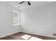 Bright bedroom with neutral walls, wood floors, and natural light from a window at 1137 Moss Grove Dr Dr, Moncks Corner, SC 29461