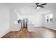 Bright open kitchen featuring white cabinets, stainless steel appliances, and a center island at 1137 Moss Grove Dr Dr, Moncks Corner, SC 29461