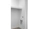 Close up of laundry room connections, with shelf in adjacent wall at 1137 Moss Grove Dr Dr, Moncks Corner, SC 29461