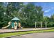 Community playground with swings and slides near lush trees at 1137 Moss Grove Dr Dr, Moncks Corner, SC 29461