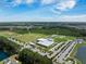 Enjoy nearby community amenities, like parks and a recreational center, surrounded by lush landscaping and a beautiful water feature at 114 Belfort Pl, Summerville, SC 29486