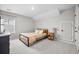 A charming bedroom with a bed, dresser, and a window providing natural light at 114 Belfort Pl, Summerville, SC 29486