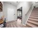 Entranceway boasting wood floors, a staircase, and access to living spaces at 114 Belfort Pl, Summerville, SC 29486
