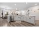 Bright, open kitchen with a large island, stainless steel appliances, and stylish finishes at 114 Belfort Pl, Summerville, SC 29486