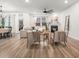 Bright living room with a fireplace, hardwood floors, and a cozy seating arrangement at 114 Belfort Pl, Summerville, SC 29486