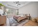 Comfortable main bedroom featuring a ceiling fan, a large bed, and natural light from a window at 114 Belfort Pl, Summerville, SC 29486